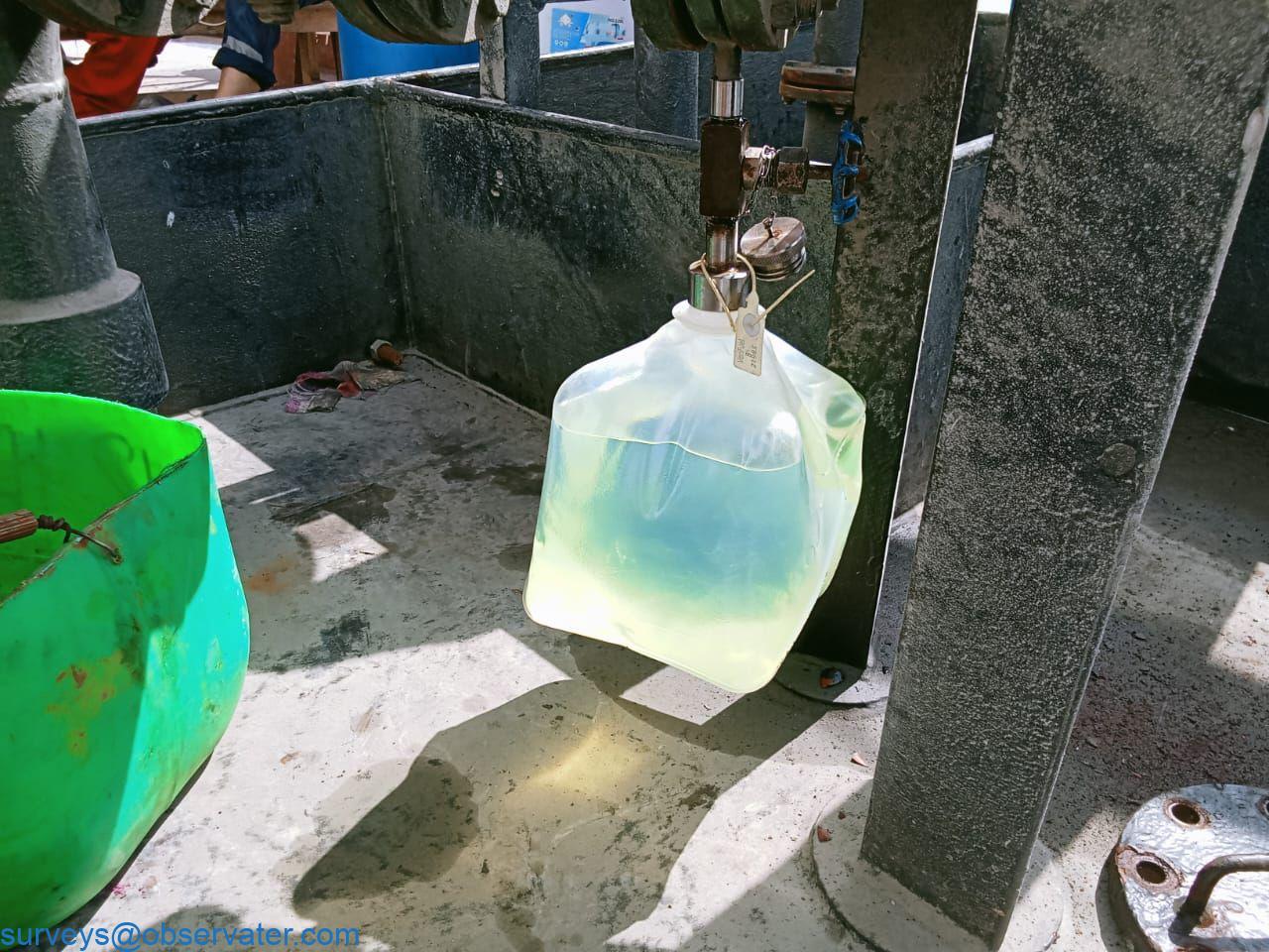 Surveyor taking bunker drip sample ISO 8217