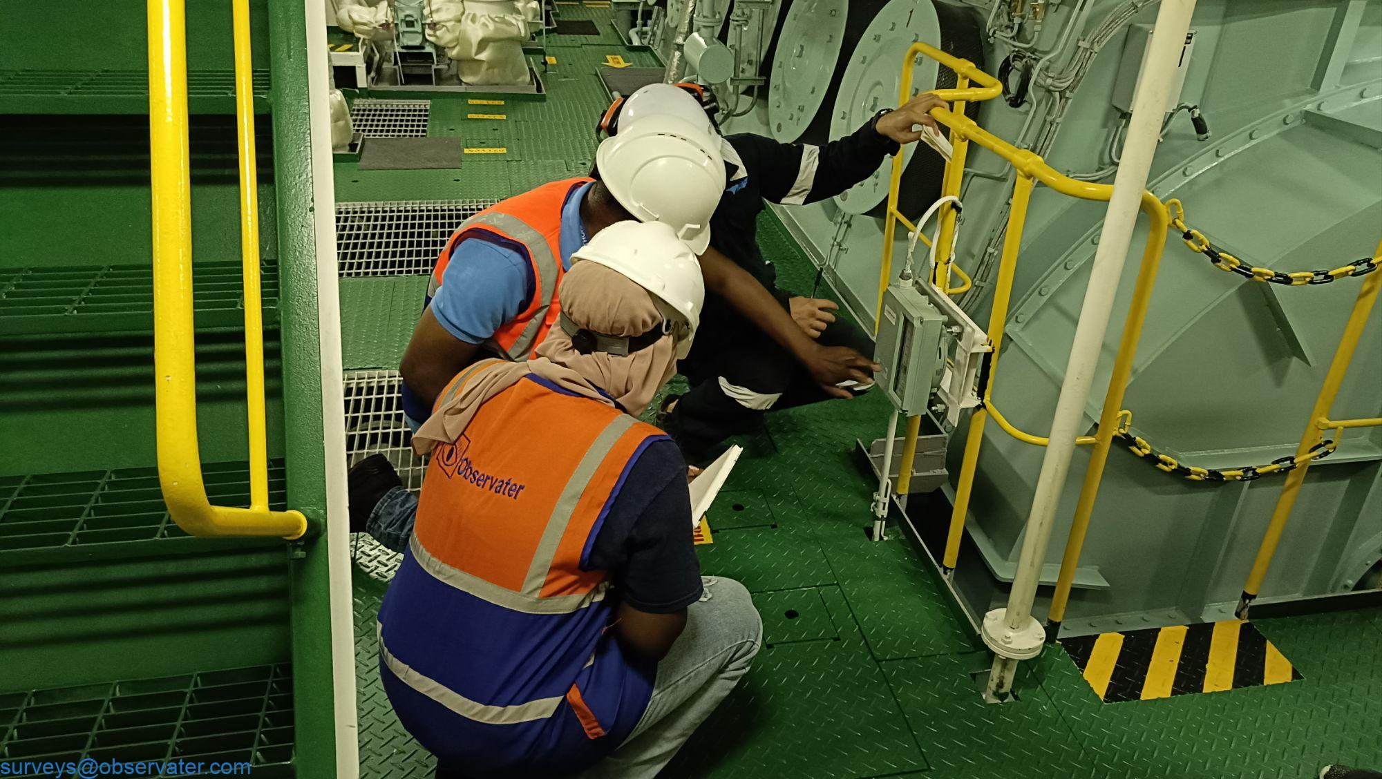 Bunker Detective Surveyor inspecting tank soundings in West Africa
